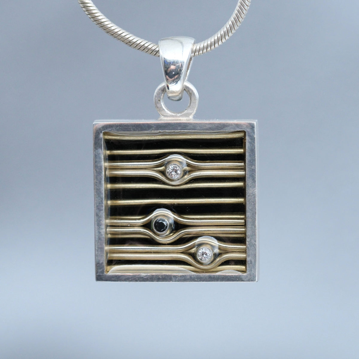 Dusk – handmade sterling silver pendant by Matthew Street Jewellery