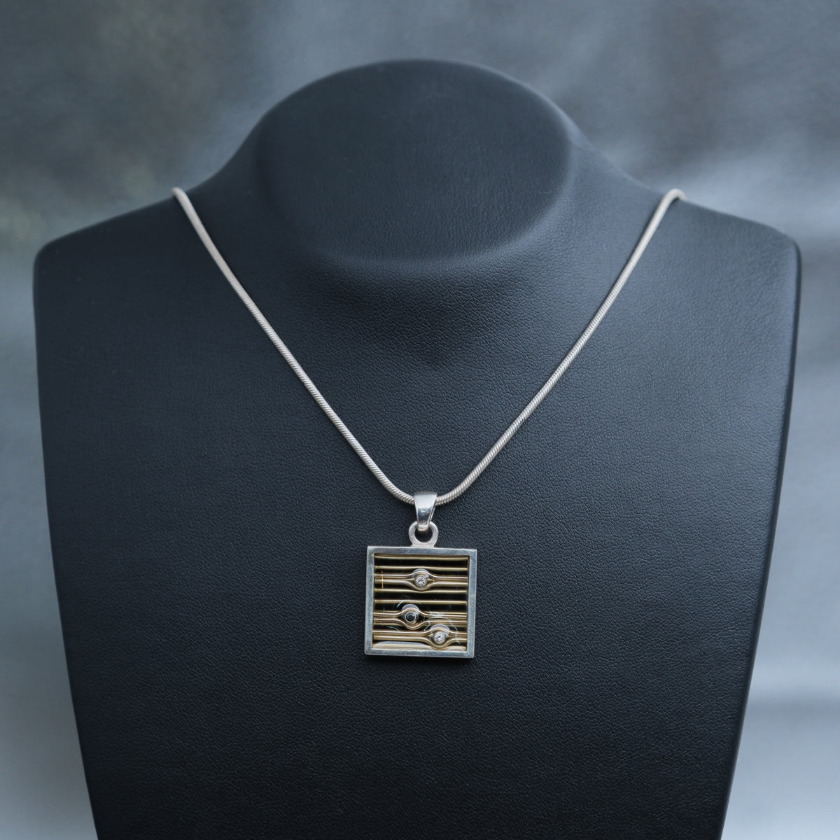 Dusk – handmade sterling silver pendant by Matthew Street Jewellery, view 3