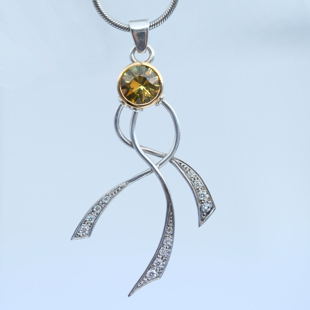 Dancing Sprite – handmade gold & silver pendant by Matthew Street Jewellery
