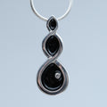 Shadow Drop – handmade sterling silver pendant by Matthew Street Jewellery