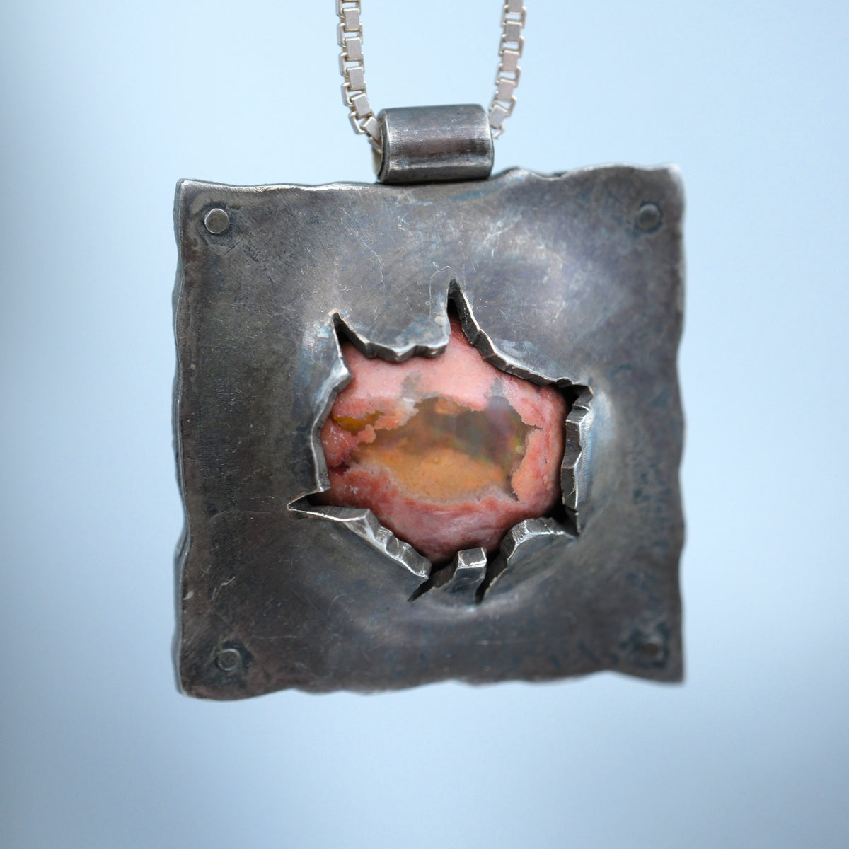 Bulging Eye – handmade sterling silver pendant by Matthew Street Jewellery