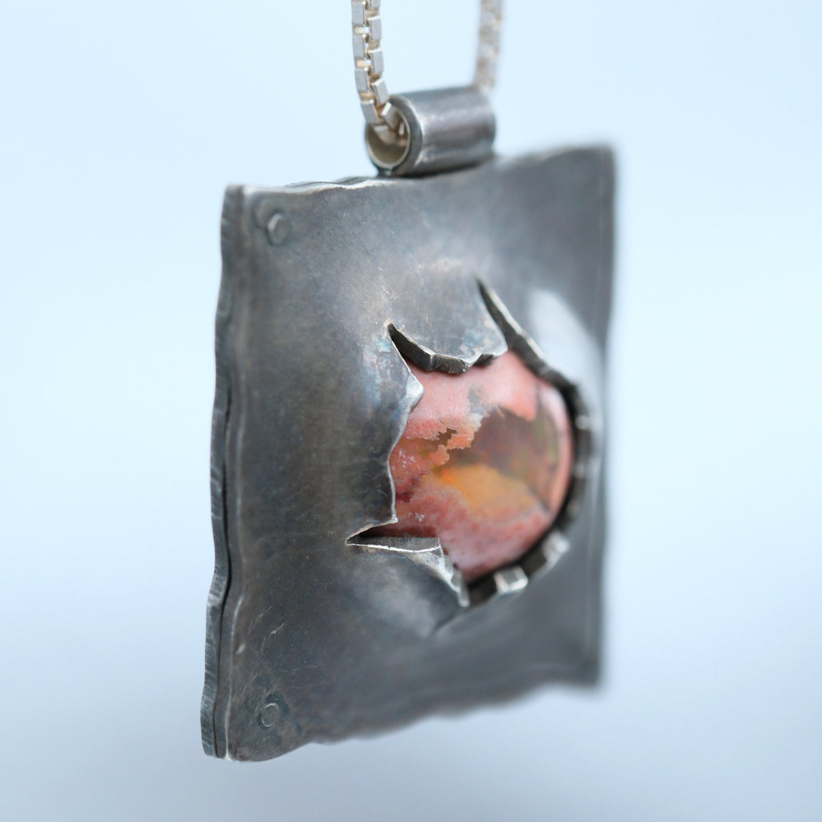 Bulging Eye – handmade sterling silver pendant by Matthew Street Jewellery, view 2