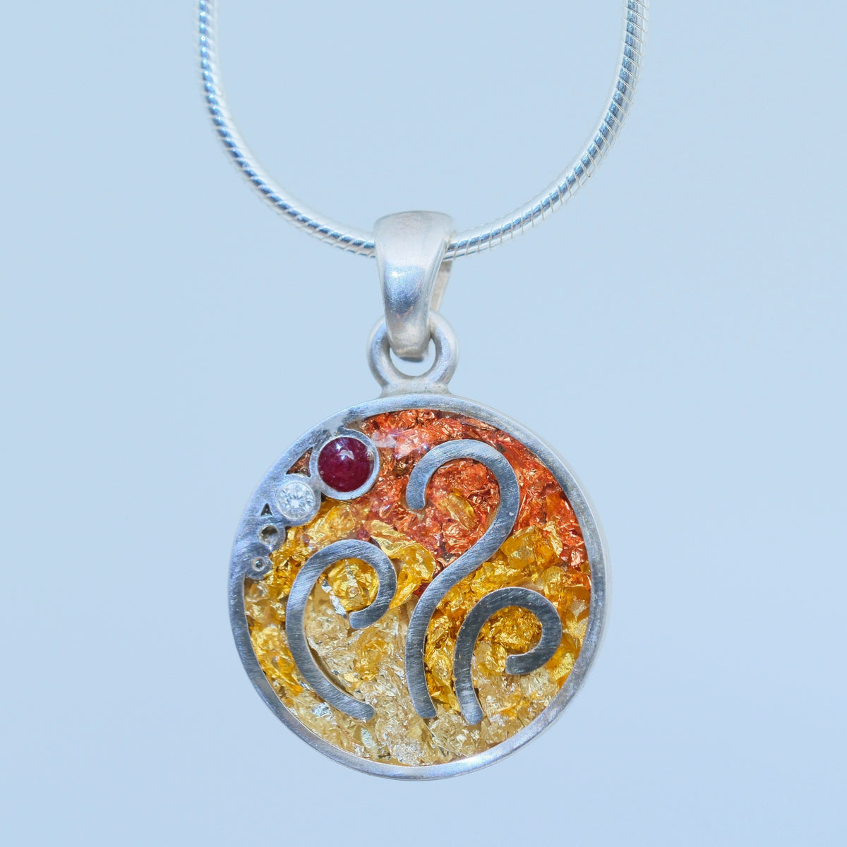 Flames – handmade gold & silver pendant by Matthew Street Jewellery