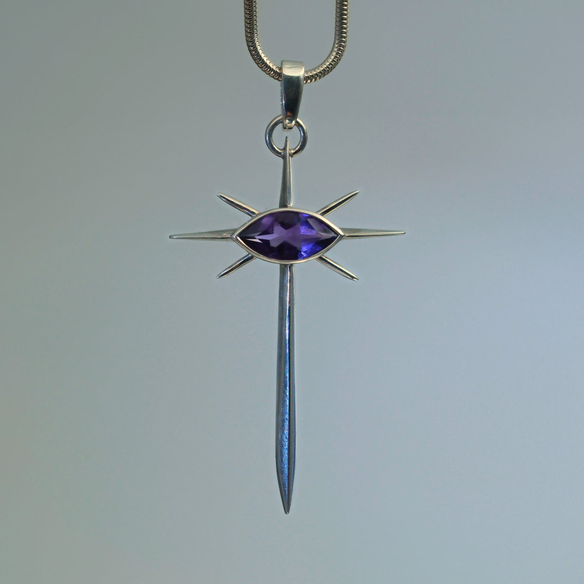 Eye of God – handmade sterling silver pendant by Matthew Street Jewellery