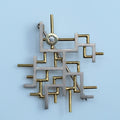 Man on the Move – handmade 18ct gold brooch by Matthew Street Jewellery