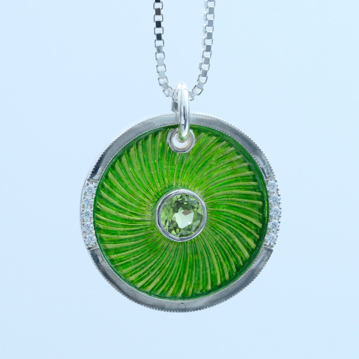 Peridot Swirl – handmade sterling silver pendant by Matthew Street Jewellery